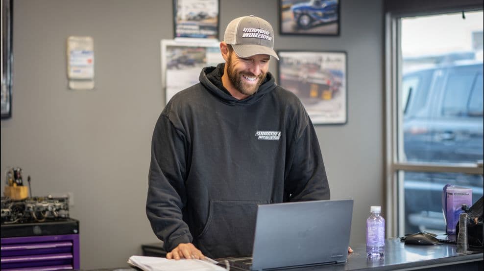 Auto Glass Installers at work, the trade Servgrow auto glass software is built for