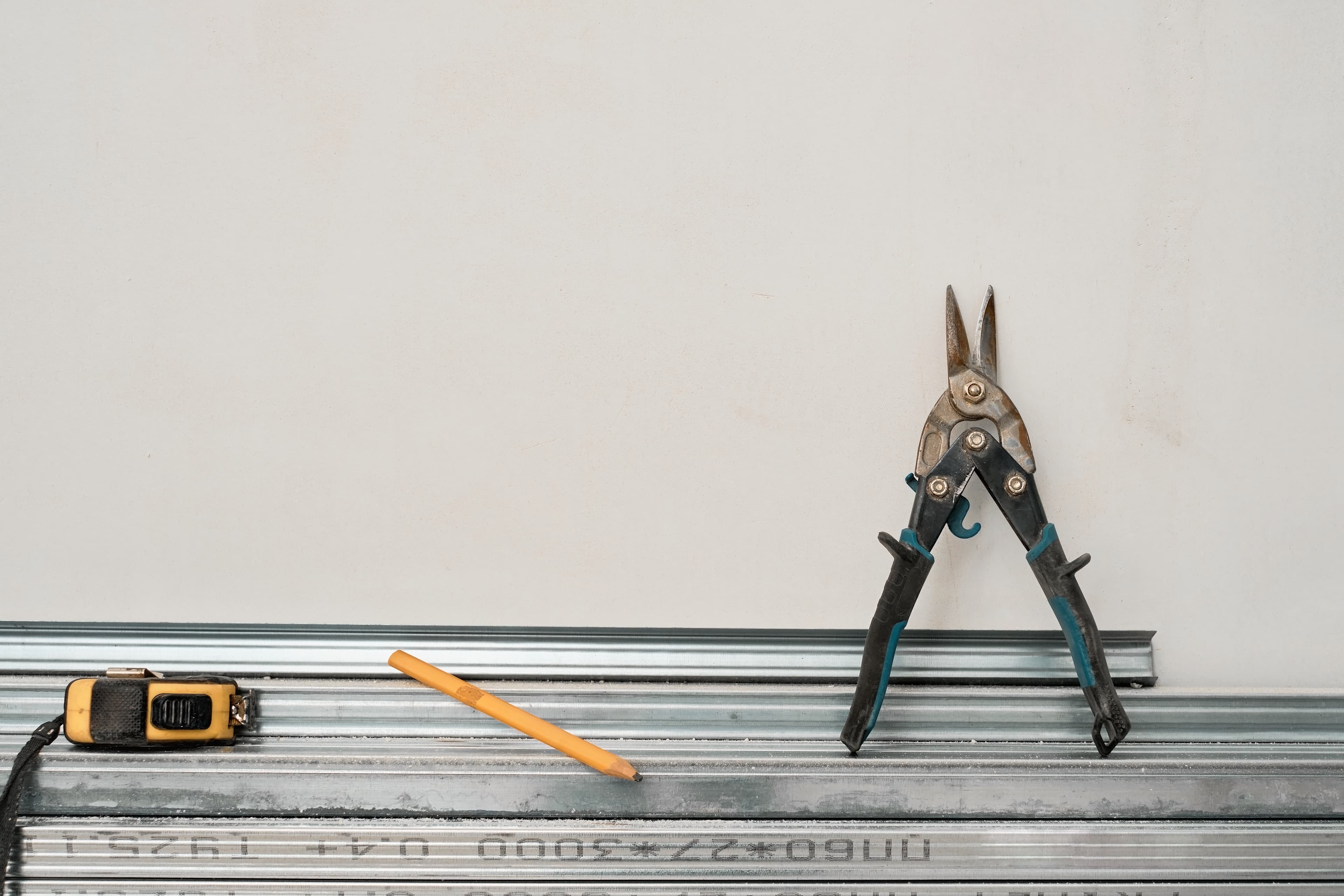 Drywall pros at work, the trade Servgrow drywall software is built for