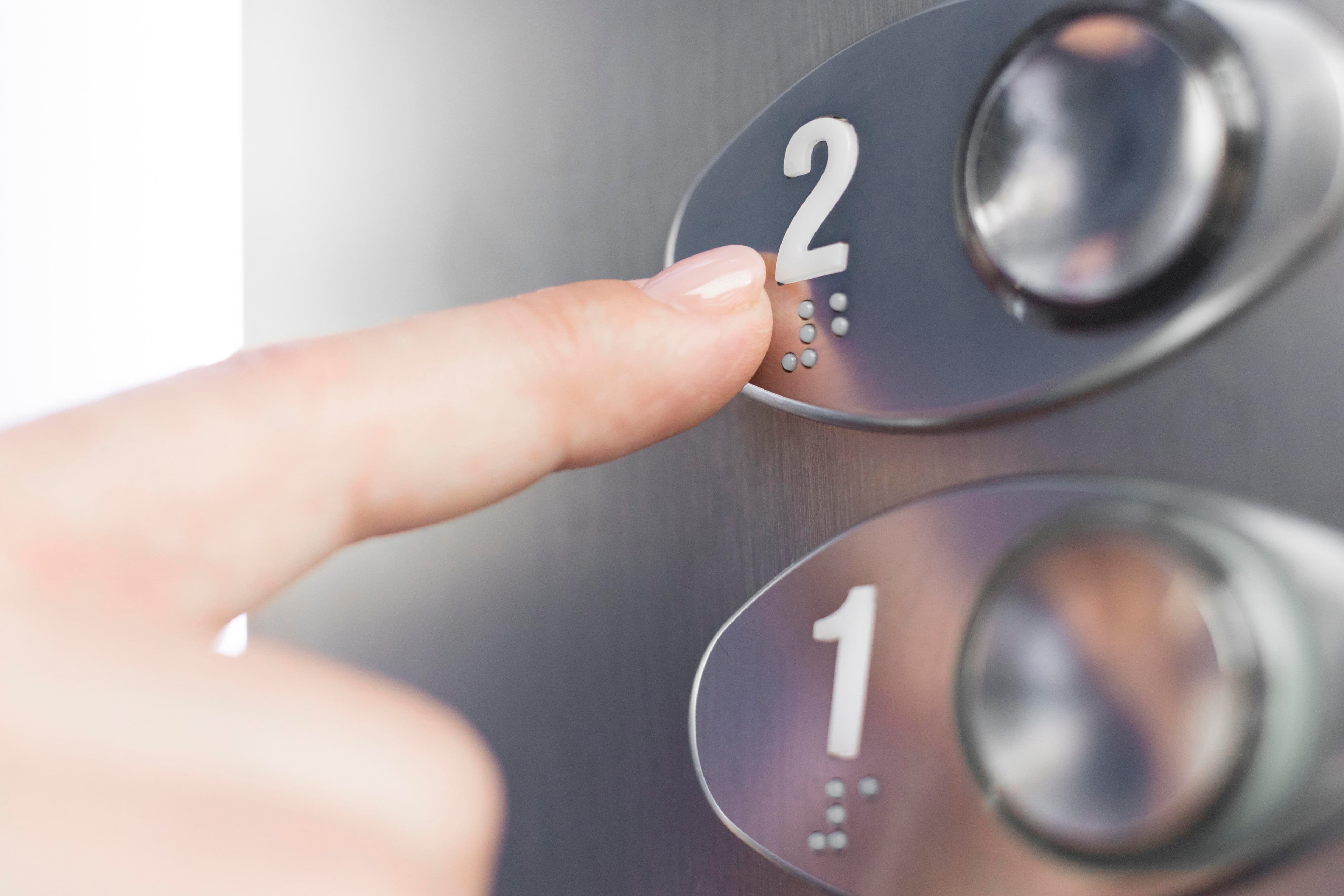 Elevator Services pros at work, the trade Servgrow elevator services software is built for