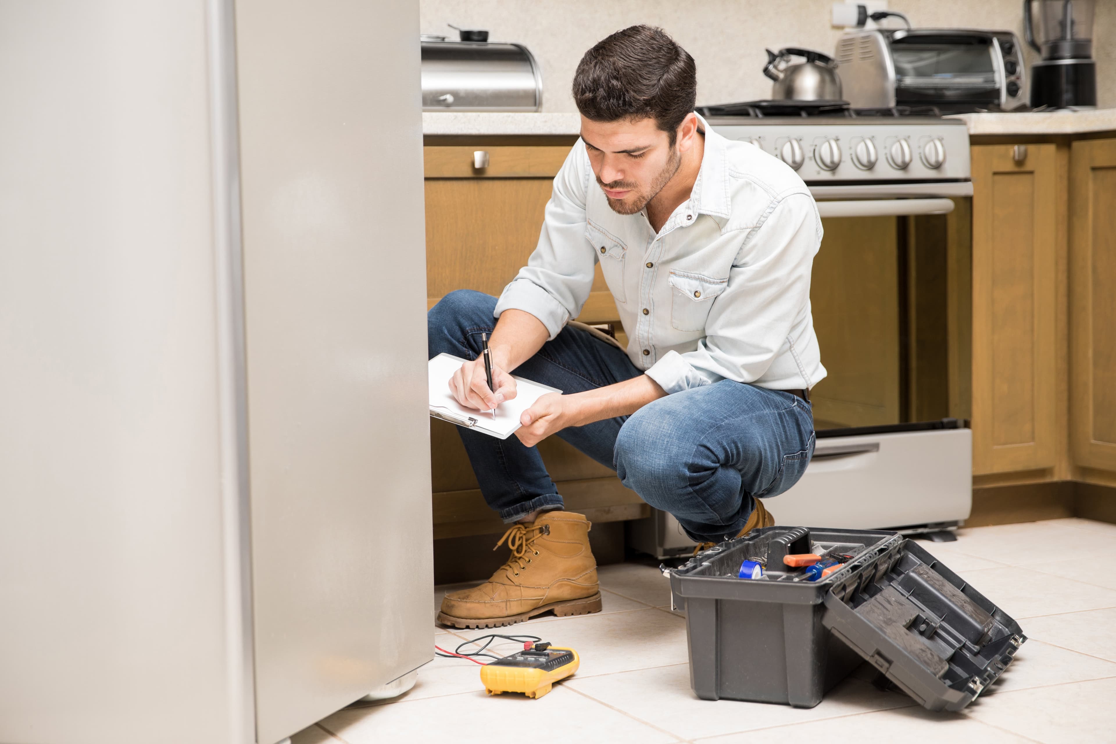 Appliance Repair Technicians at work, the trade Servgrow appliance repair software is built for