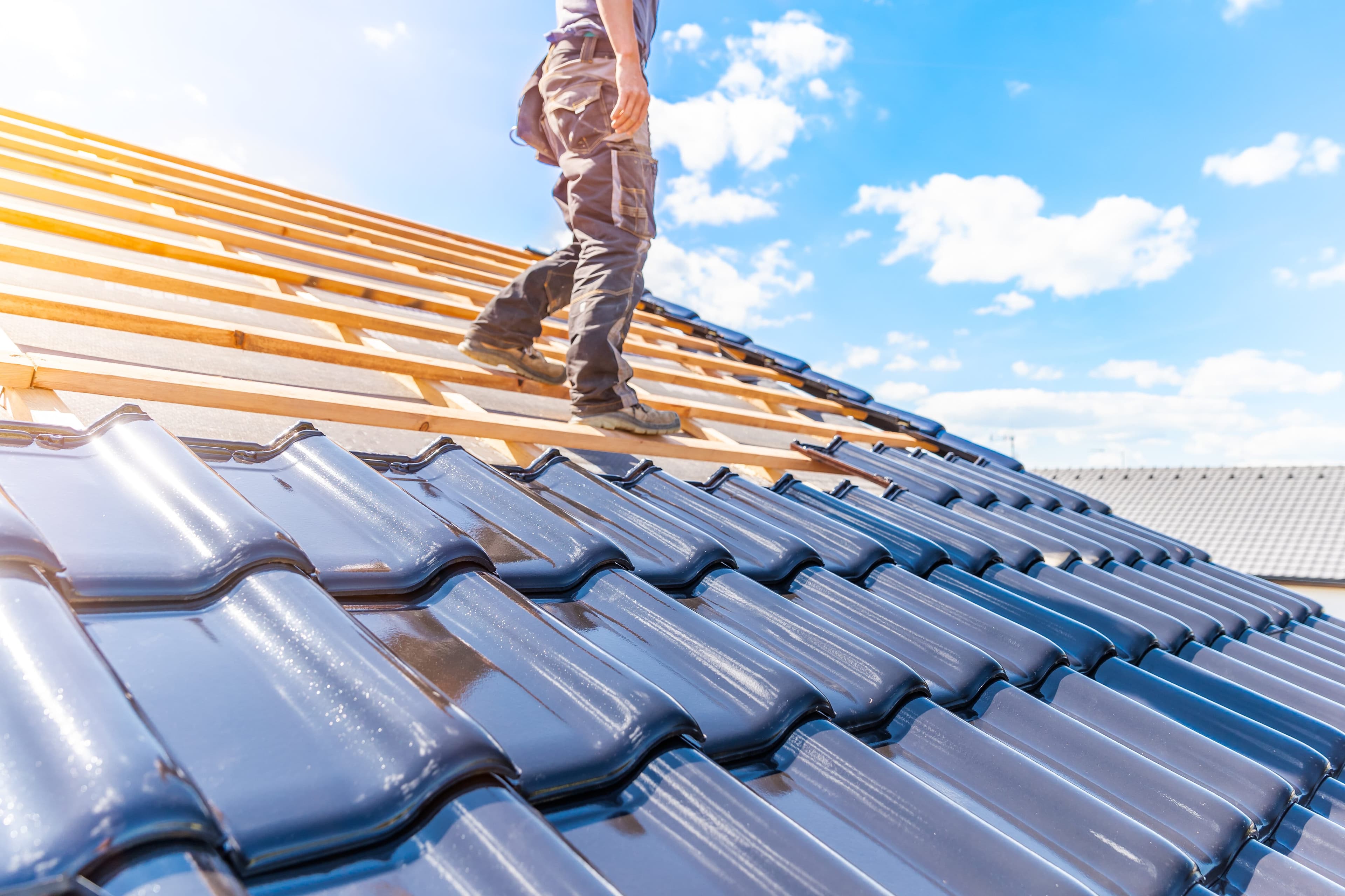 Roofers at work, the trade Servgrow roofing software is built for